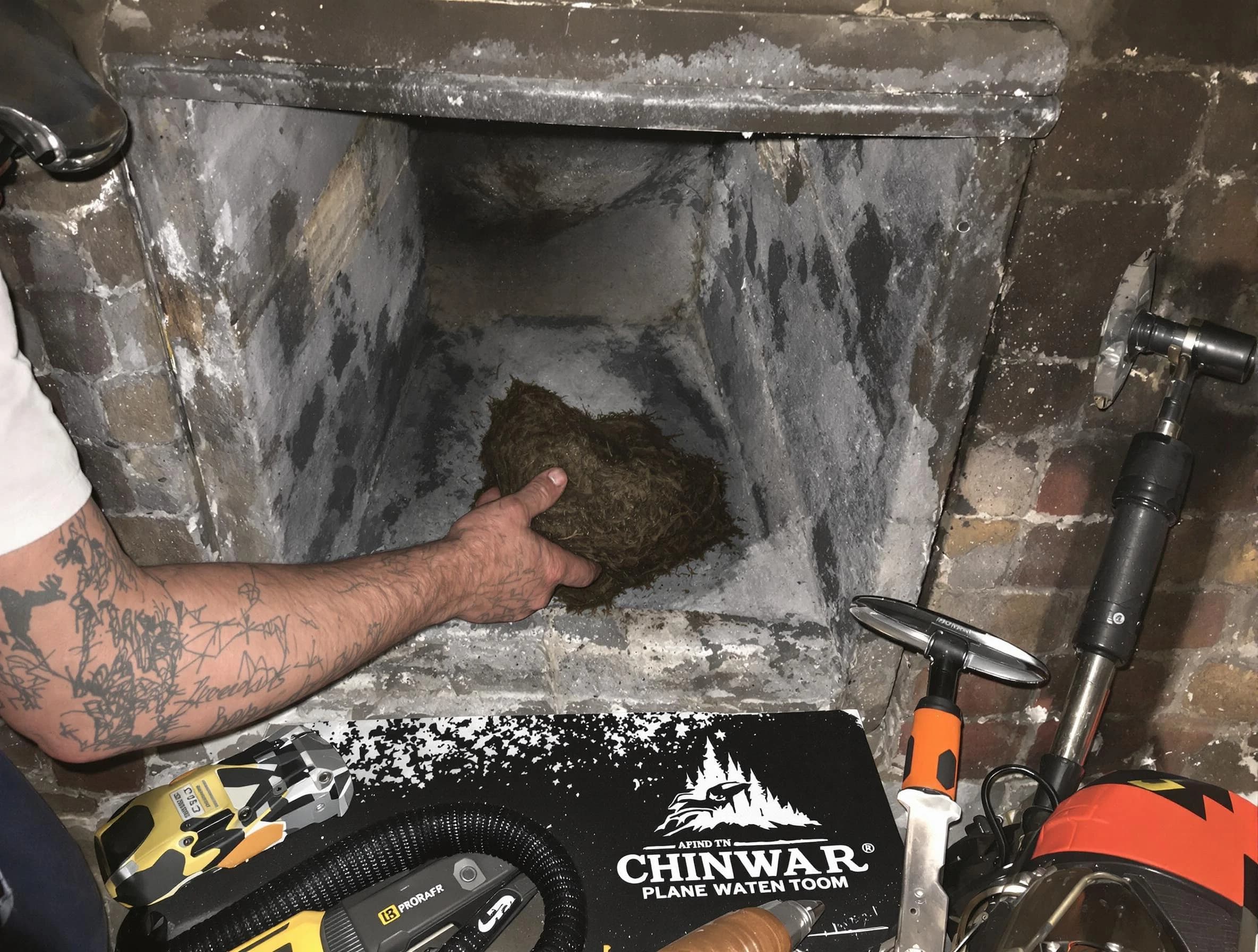 Monument Chimney Sweep safely removing debris and screening chimney in Monument, CO