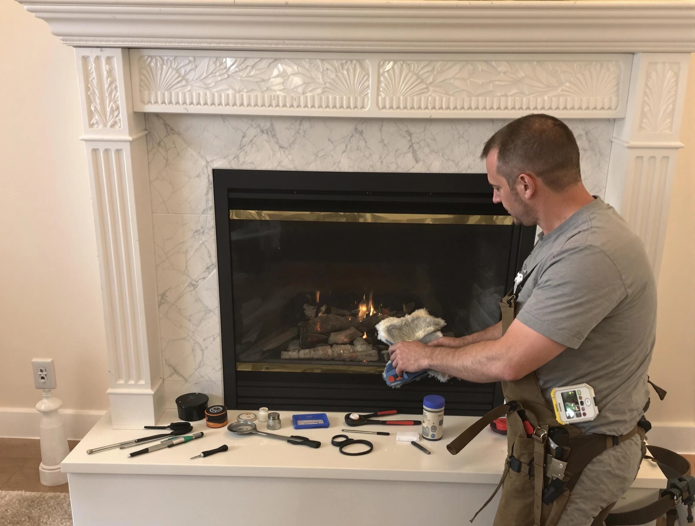 Monument Chimney Sweep performing fireplace maintenance in Monument, CO
